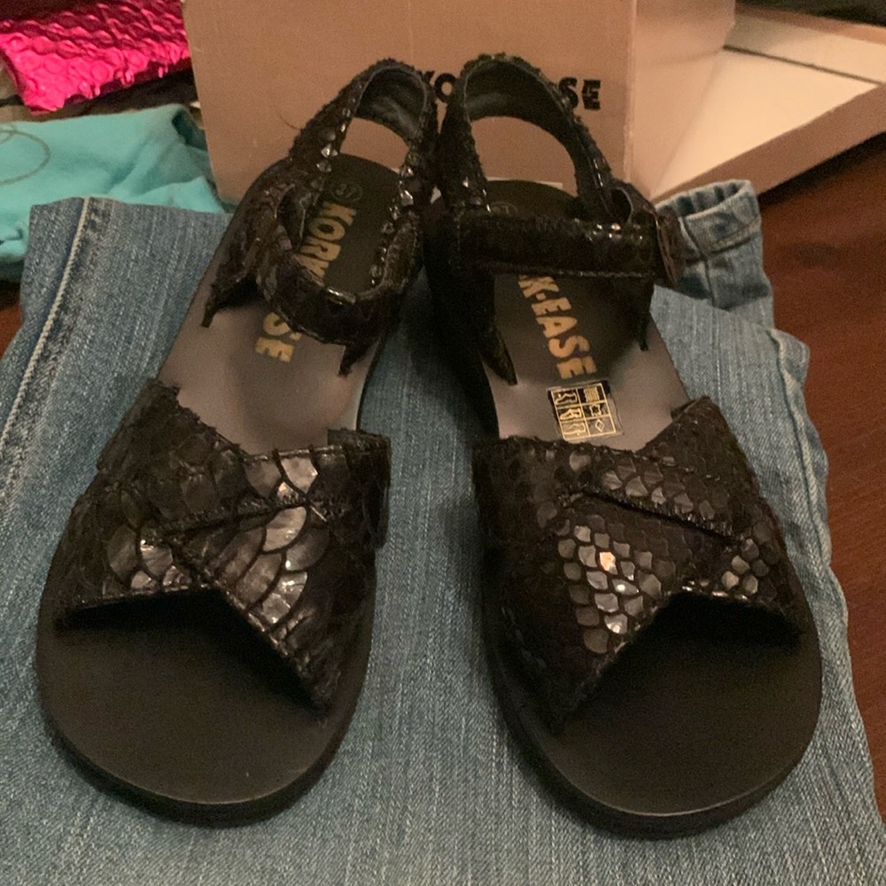 New without tags.  Size 37 black python Kork-Ease sandals (roughly size 6.5/7)